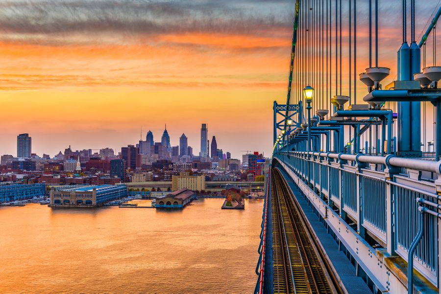 Philadelphia skyline at sunset from the side of the Ben Franklin bridge